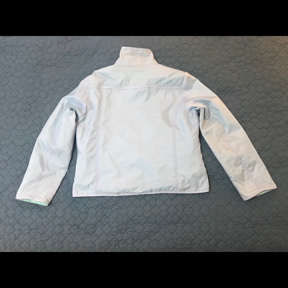 Windbreaker women’s lt blue nylon size L, fits M